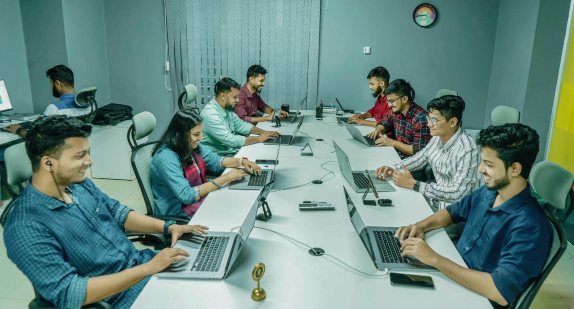 Team collaboration workspace showing developers working together on complex technical solutions